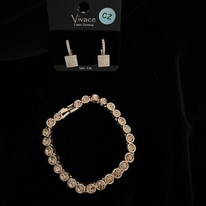 Bundle of gold tone earrings and bracelet with rose gold rhinestones only $10